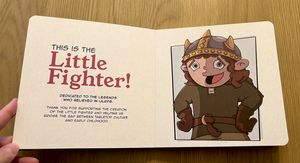 The cover of Little Fighter: A LilRPG Adventure, a deep plum board book with a repeating pattern of skulls, potions, and swords.